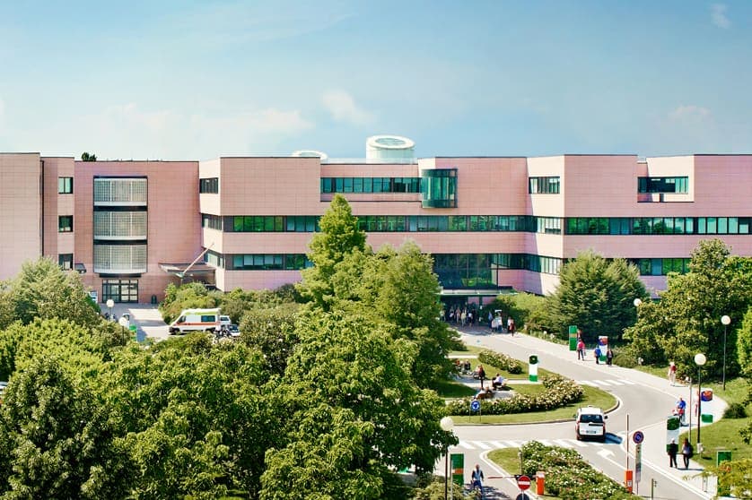 Aerial view of a Humanitas hospital campus with tree-lined access roads