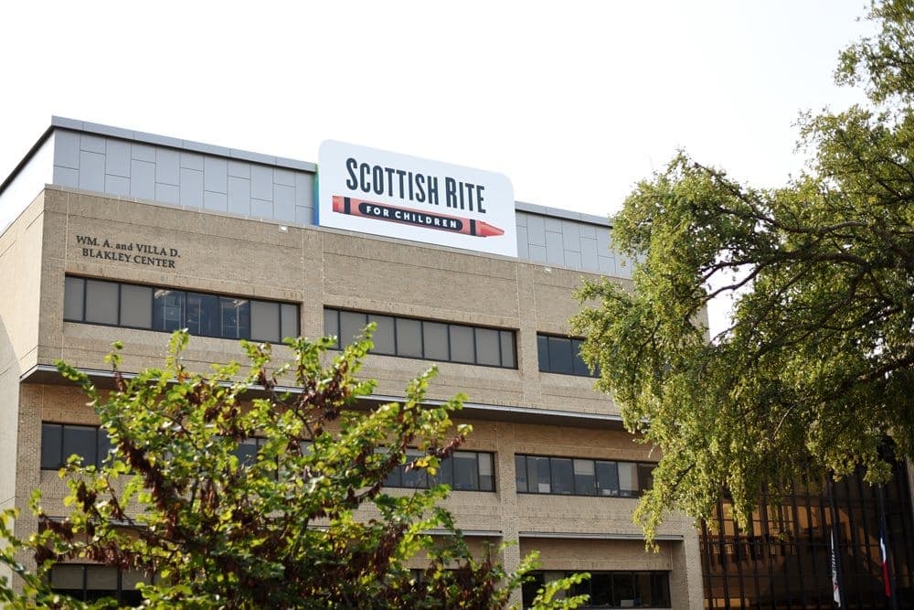Scottish Rite for Children building exterior with the hospital's rooftop sign