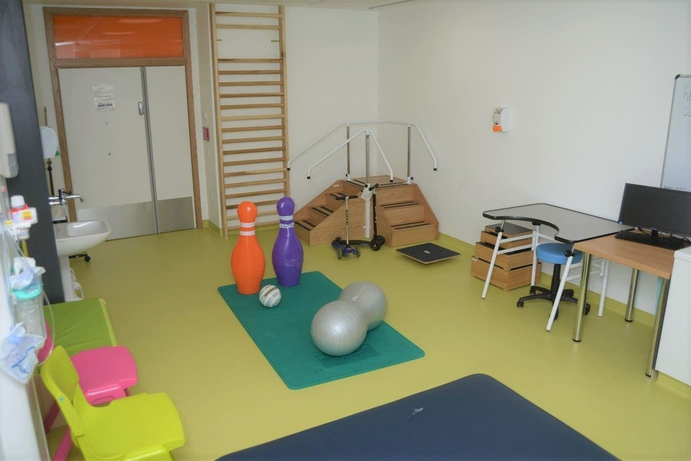 Therapy room of the paediatric limb reconstruction service, with exercise equipment and wall bars